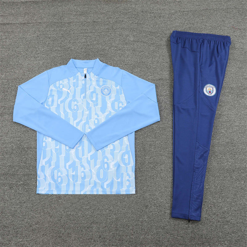 Manchester City with the 2024/2025 Blue Tracksuit - Image 3